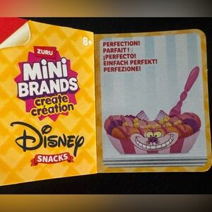 Cheshire cat Alice in Wonderland hot dog
Zuru Mini Brands create Disney snacks